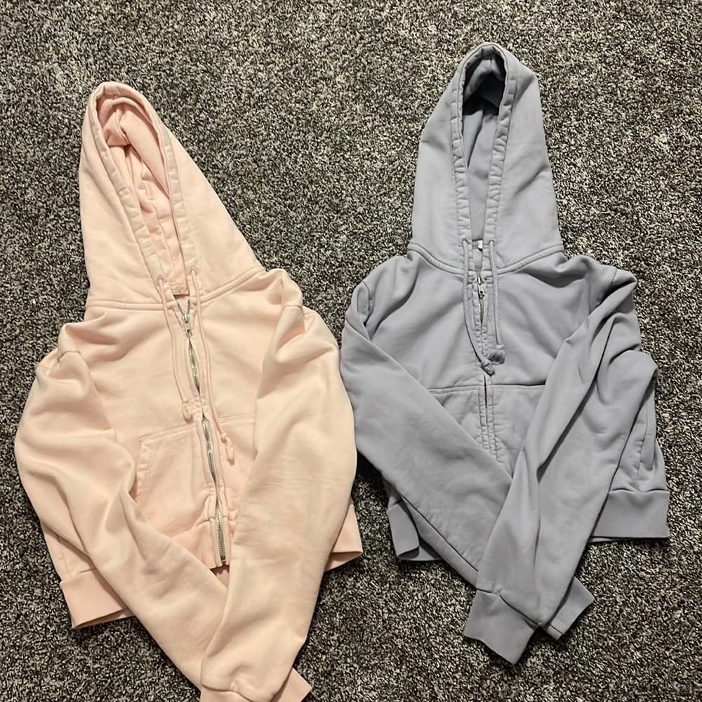 John galt/brandy Melville cropped pink and purple zip up hoodies!